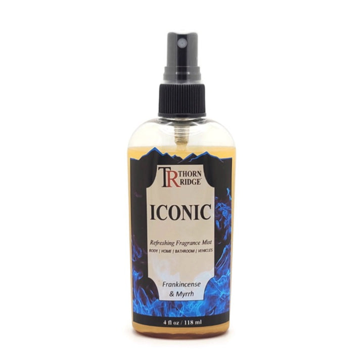 A bottle of Thorn Ridge fragrance mist labeled "Iconic," described as a frankincense and myrrh scent for body, home, bathroom, and vehicles. 4 fl oz.