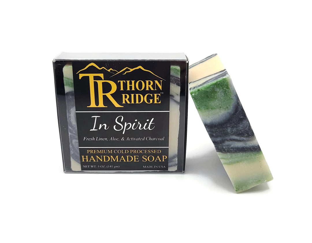 Packaging of Thorn Ridge soap labeled "In Spirit," described as fresh linen, aloe, activated charcoal, premium cold processed, handmade, 5 oz. Made in USA.