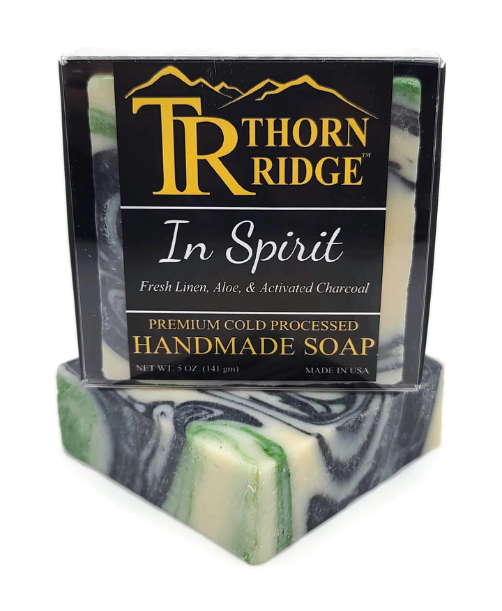 Packaging of Thorn Ridge soap labeled "In Spirit," described as fresh linen, aloe, activated charcoal, premium cold processed, handmade, 5 oz. Made in USA.