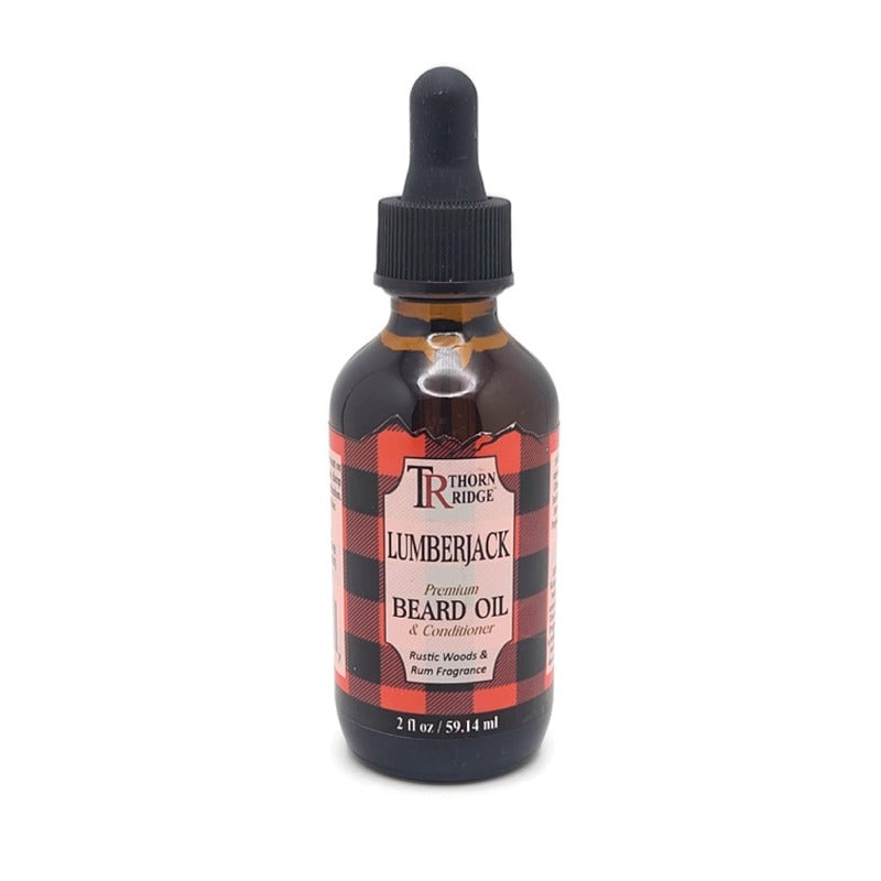 A bottle of Thorn Ridge beard oil labeled "Lumberjack," described as a premium beard oil and conditioner with a rustic woods and rum scent. 2 fl oz.