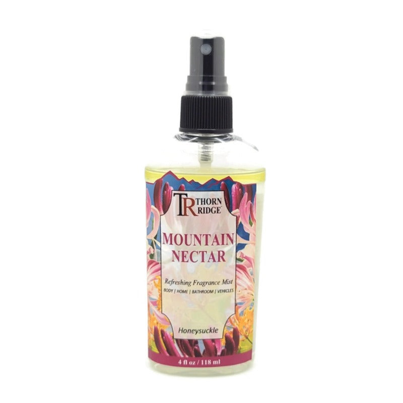 A bottle of Thorn Ridge fragrance mist labeled "Mountain Nectar," described as a honeysuckle scent for body, home, bathroom, and vehicles. 4 fl oz.