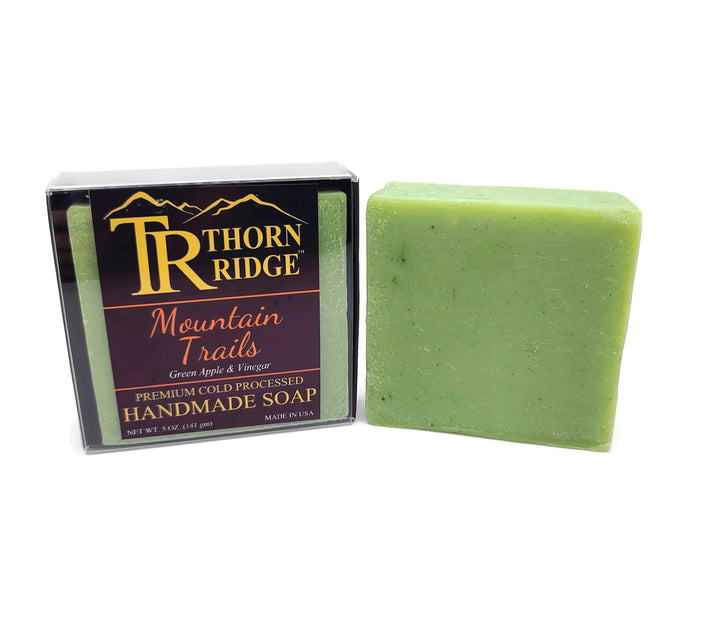 Packaging of Thorn Ridge soap labeled "Mountain Trails," described as green apple and vinegar, premium cold processed, handmade, 5 oz. Made in USA.