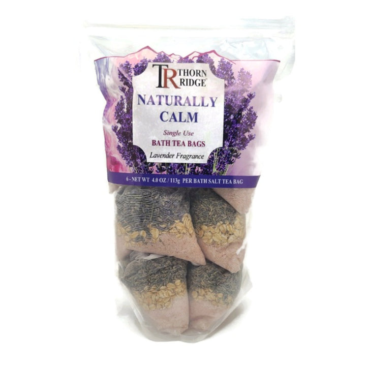 A bag of Thorn Ridge single use bath tea bag soaks labeled "Naturally Calm," described as a lavender fragrance. 4.0 oz per bath tea. 6 pack. 24 oz total.