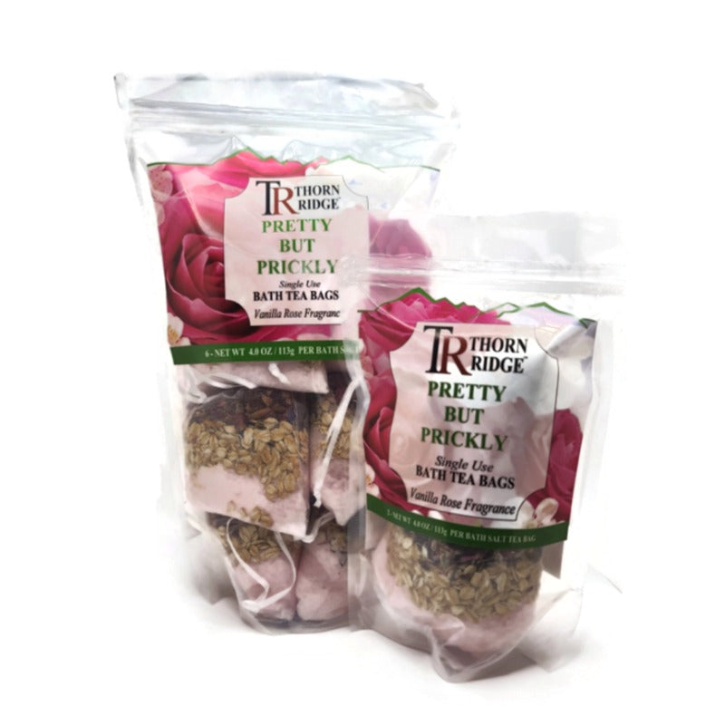 A bag of Thorn Ridge single use bath tea bag soaks labeled "Pretty But Prickly," described as a vanilla rose fragrance. 4.8 oz. 2 pack and 6 pack pictured.