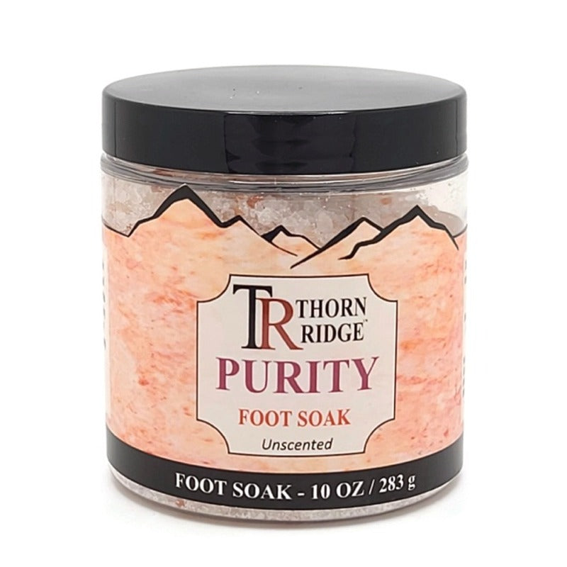 A jar of Thorn Ridge foot soak labeled "Purity," described as an unscented multi-salt foot soak. 10 oz.