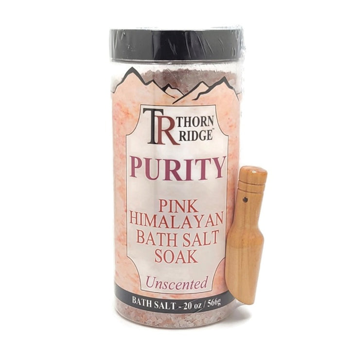 A container of Thorn Ridge fragrance mist labeled "Purity" described as a unscented pink himalayan bath salt soak with a regular top. 20 oz.