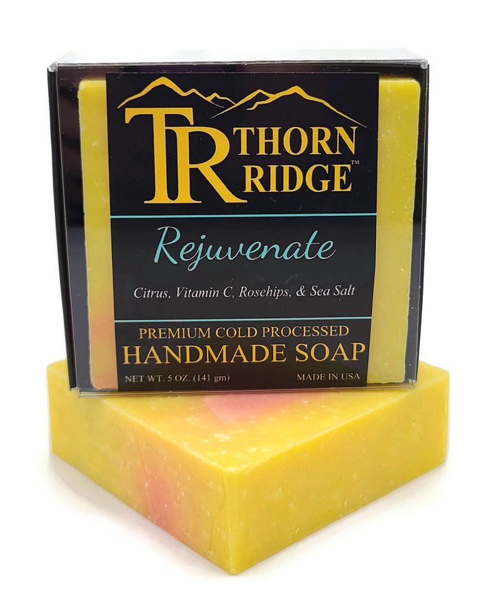 Packaging of Thorn Ridge soap labeled "Rejuvenate," described as citrus, vitamin C, rosehips, sea salt, premium cold processed, handmade, 5 oz. Made in USA.