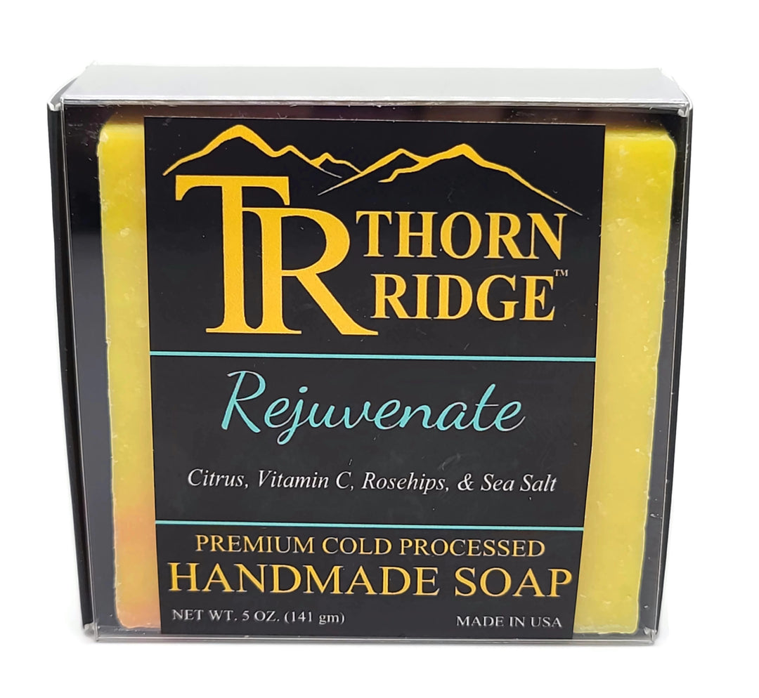 Packaging of Thorn Ridge soap labeled "Rejuvenate," described as citrus, vitamin C, rosehips, sea salt, premium cold processed, handmade, 5 oz. Made in USA.