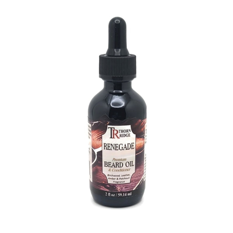 A bottle of Thorn Ridge beard oil labeled "Renegade," described as a premium beard oil and conditioner with a birchwood, leather, amber and patchouli fragrance. 2 fl oz.