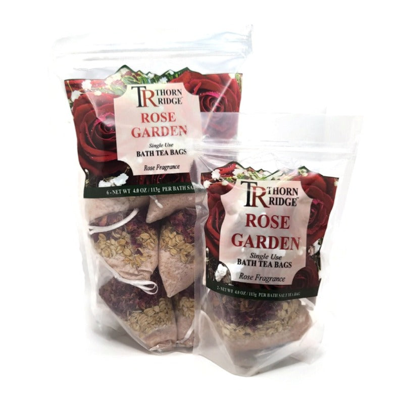 A bag of Thorn Ridge single use bath tea bag soaks labeled "Rose Garden," described as a rose fragrance. 4.0 oz per bath tea. 2 pack. 8 oz total. 6 pack also pictured.