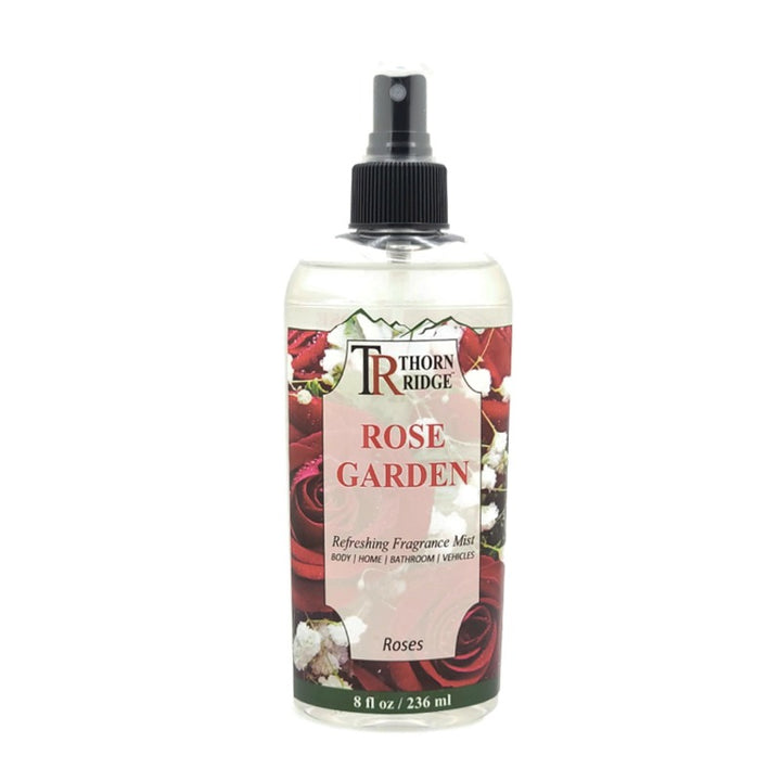 A bottle of Thorn Ridge fragrance mist labeled "Rose Garden," described as a rose scent for body, home, bathroom, and vehicles. 8 fl oz.