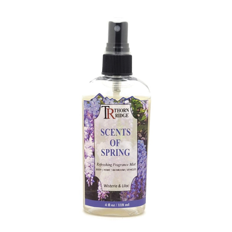 A bottle of Thorn Ridge fragrance mist labeled "Scents Of Spring," described as a wisteria and lilac  scent for body, home, bathroom, and vehicles. 4 fl oz.