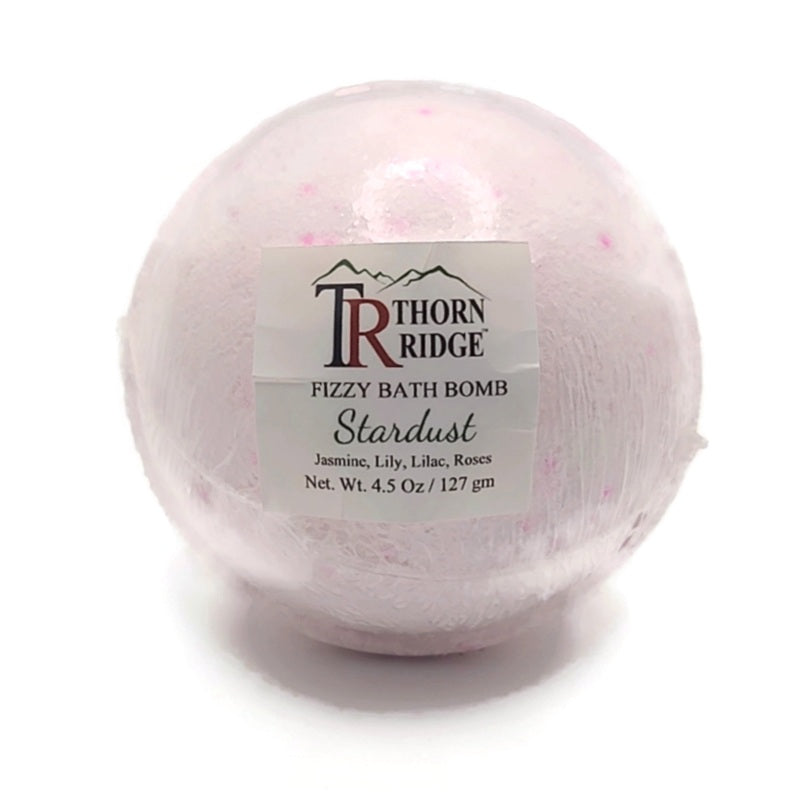 A Thorn Ridge fizzy bath bomb labeled "Stardust," described as a jasmine, lily, lilac, and roses fragrance. 4.5 oz.