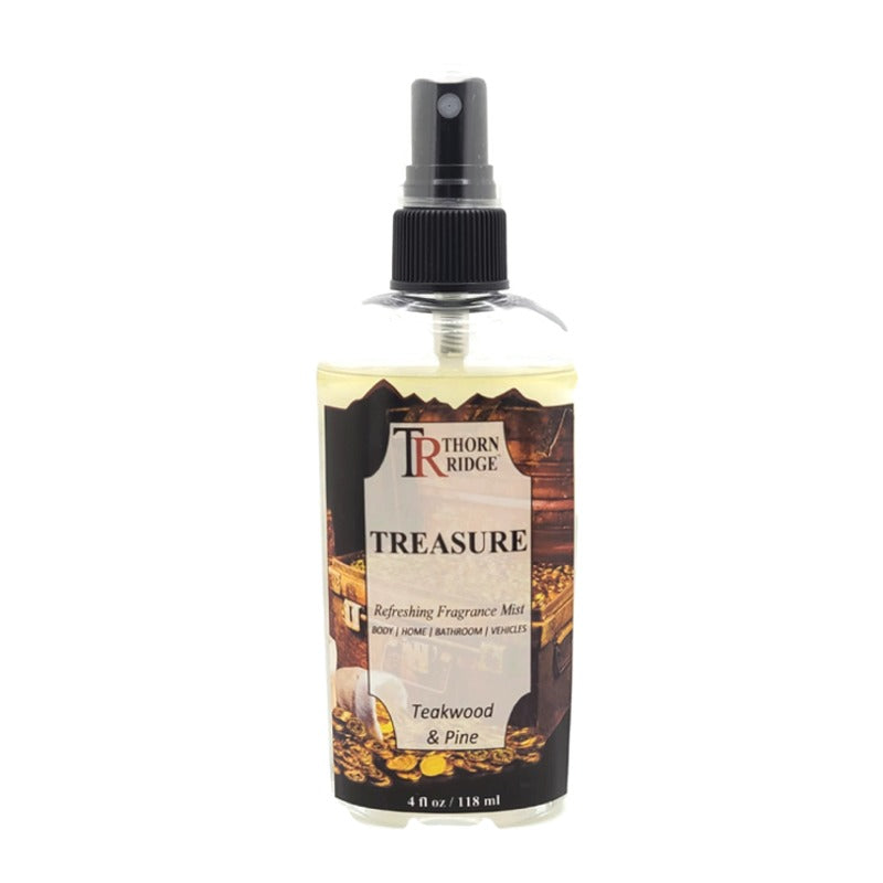 A bottle of Thorn Ridge fragrance mist labeled "Treasure," described as a teakwood and pine scent for body, home, bathroom, and vehicles. 8 fl oz.