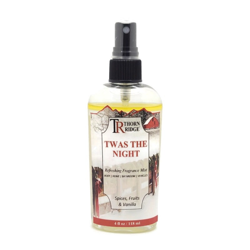 A bottle of Thorn Ridge fragrance mist labeled "Twas The Night," described as a spices, fruits, and vanilla scent for body, home, bathroom, and vehicles. 4 fl oz.