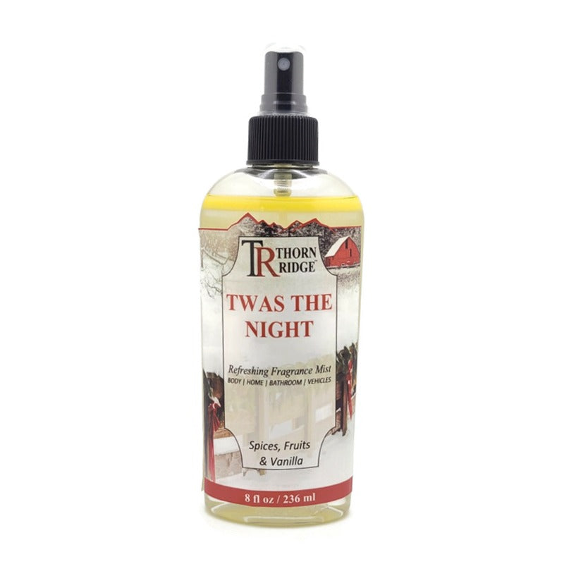 A bottle of Thorn Ridge fragrance mist labeled "Twas The Night," described as a spices, fruits, and vanilla scent for body, home, bathroom, and vehicles. 8 fl oz.