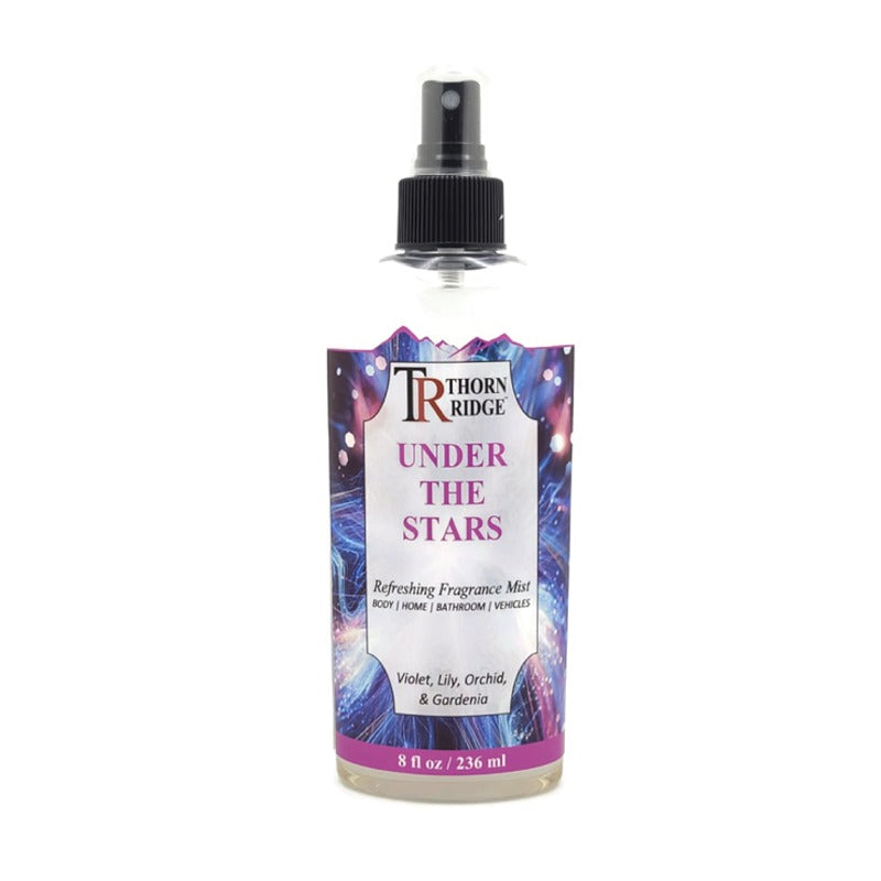 A bottle of Thorn Ridge fragrance mist labeled "Under The Stars," described as a violet, lily, orchid, and gardenia scent for body, home, bathroom, and vehicles. 8 fl oz.