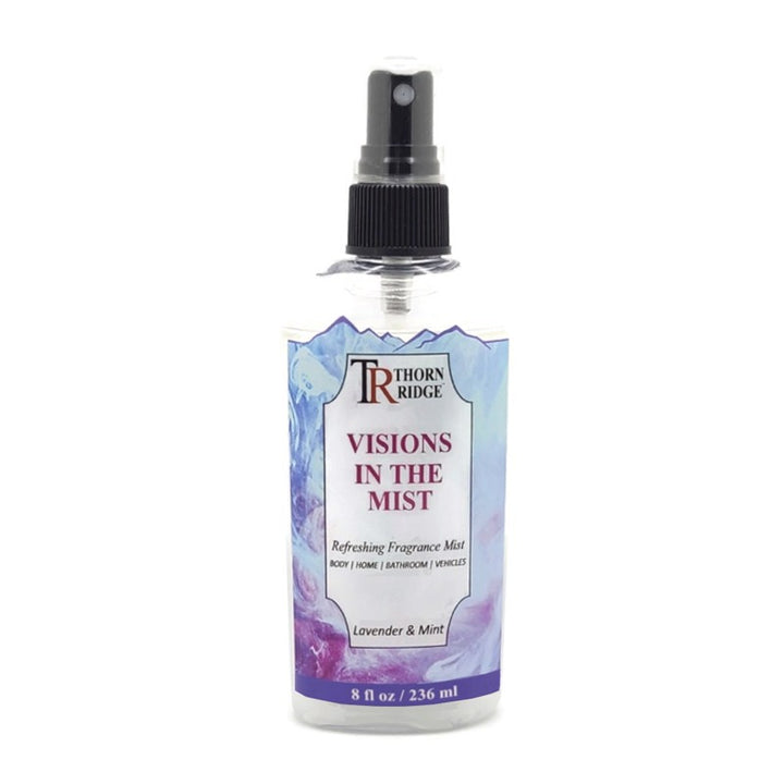 A bottle of Thorn Ridge fragrance mist labeled "Visions In The Mist," described as a lavender and mint scent for body, home, bathroom, and vehicles. 8 fl oz.