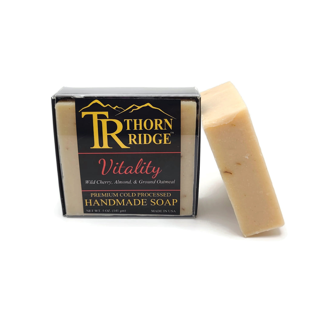 Packaging of Thorn Ridge soap labeled "Vitality," described as wild cherry, almond and ground oatmeal, premium cold processed, handmade, 5 oz. Made in USA.