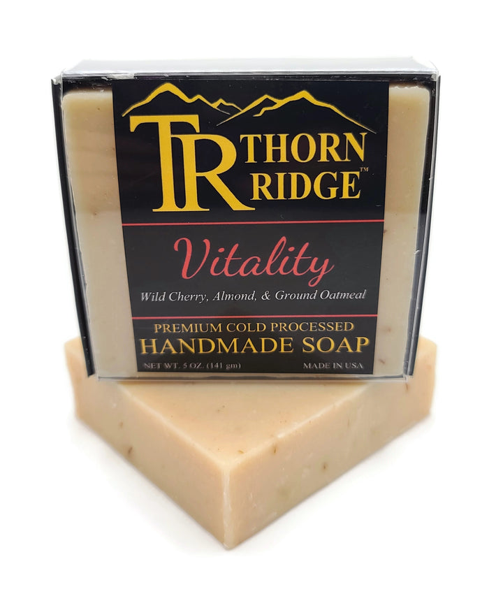 Packaging of Thorn Ridge soap labeled "Vitality," described as wild cherry, almond and ground oatmeal, premium cold processed, handmade, 5 oz. Made in USA.