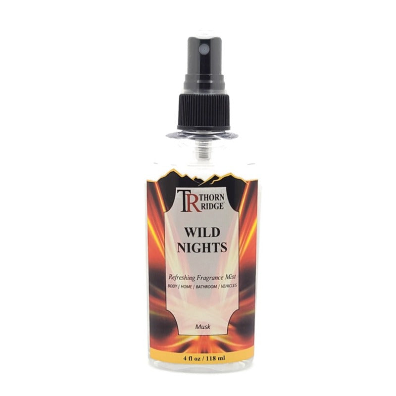 A bottle of Thorn Ridge fragrance mist labeled "Wild Nights," described as a musk scent for body, home, bathroom, and vehicles. 4 fl oz.