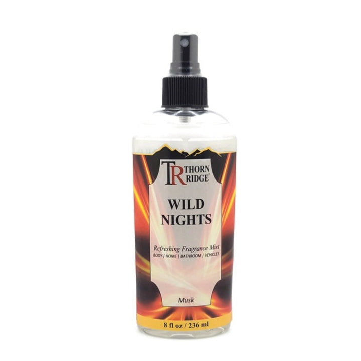 A bottle of Thorn Ridge fragrance mist labeled "Wild Nights," described as a musk scent for body, home, bathroom, and vehicles. 8 fl oz.