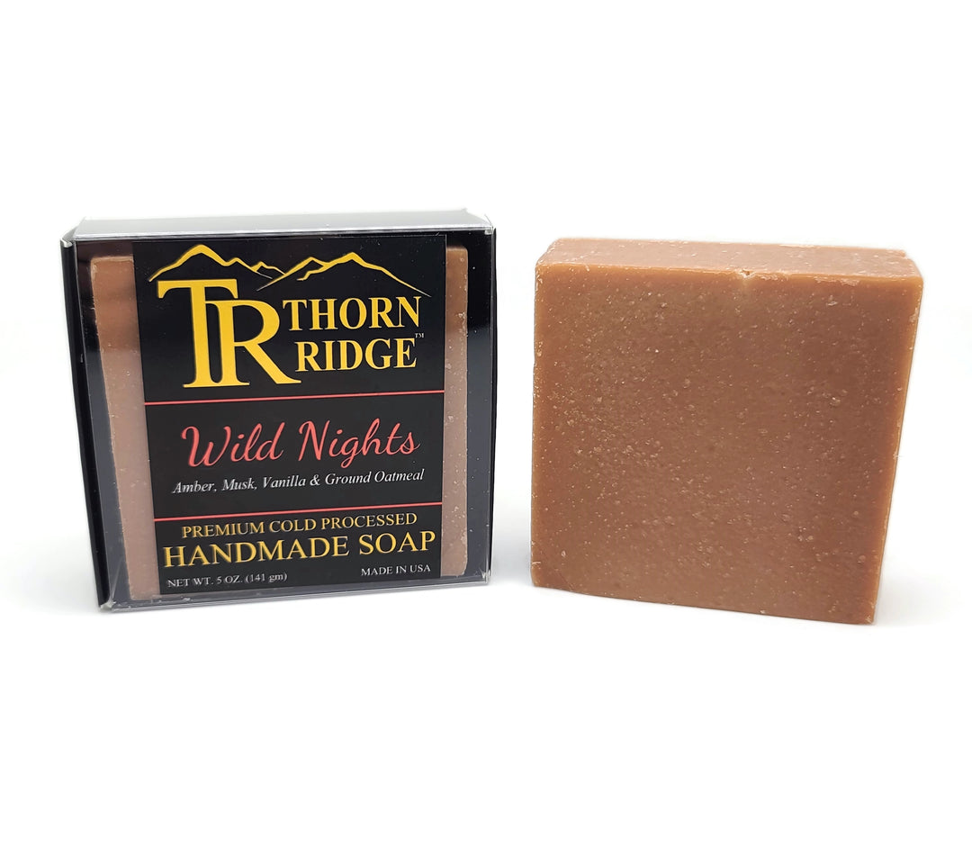 Packaging of Thorn Ridge soap labeled "Wild Nights," described as amber, musk, vanilla, ground oatmeal, premium cold processed, handmade, 5 oz. Made in USA.