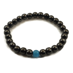 Magnetic bracelet with a blue gemstone.
