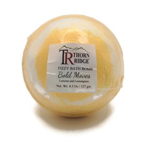 A Thorn Ridge fizzy bath bomb labeled "Bold Moves," described as a lemons and lemongrass fragrance. 4.5 oz.