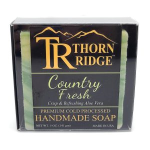 Packaging of Thorn Ridge soap labeled "Country Fresh," described as crisp and refreshing aloe vera, premium cold processed, handmade, 5 oz. Made in USA.