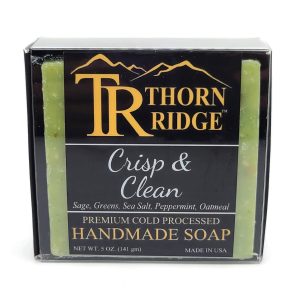 Packaging of Thorn Ridge soap labeled "Crisp and Clean," described as sage, greens, sea salt, peppermint, oatmeal, premium cold processed, handmade, 5 oz. Made in USA.