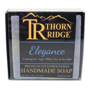 Packaging of Thorn Ridge soap labeled "Elegance," described as lemongrass, sage, white tea, sea salt, premium cold processed, handmade, 5 oz. Made in USA.