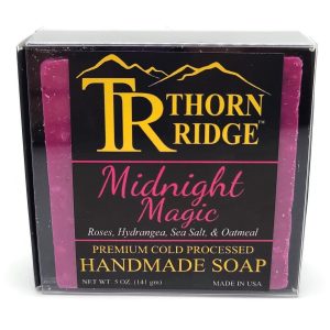 Packaging of Thorn Ridge soap labeled "Midnight Magic," described as roses, hydrangea, sea salt, oatmeal, premium cold processed, handmade, 5 oz. Made in USA.