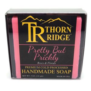Packaging of Thorn Ridge soap labeled "Pretty But Prickly," described as roses and florals, premium cold processed, handmade, 5 oz. Made in USA.