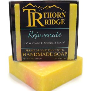 Packaging of Thorn Ridge soap labeled "Rejuvenate," described as citrus, vitamin C, rosehips, sea salt, premium cold processed, handmade, 5 oz. Made in USA.