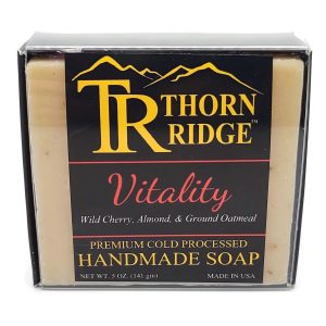 Packaging of Thorn Ridge soap labeled "Vitality," described as wild cherry, almond and ground oatmeal, premium cold processed, handmade, 5 oz. Made in USA.